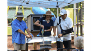 Ribbon-cutting of little library kiosk