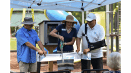 Ribbon-cutting of little library kiosk