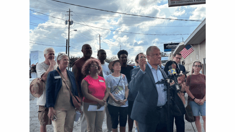 Rep. David Wilkerson speaking in front of members of Cobb legislative delegation and community members at press conference on school district's public comment policies