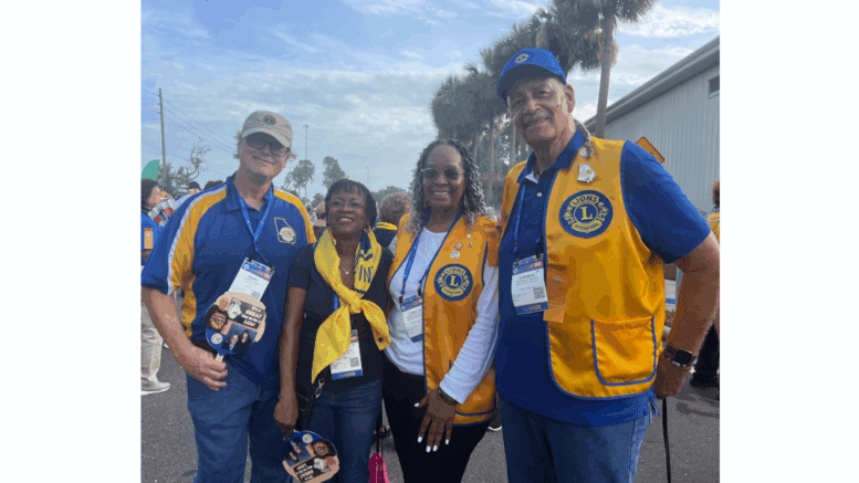 Group shot of four South Cobb Lions at convention