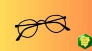 A folded pair of round eye glasses