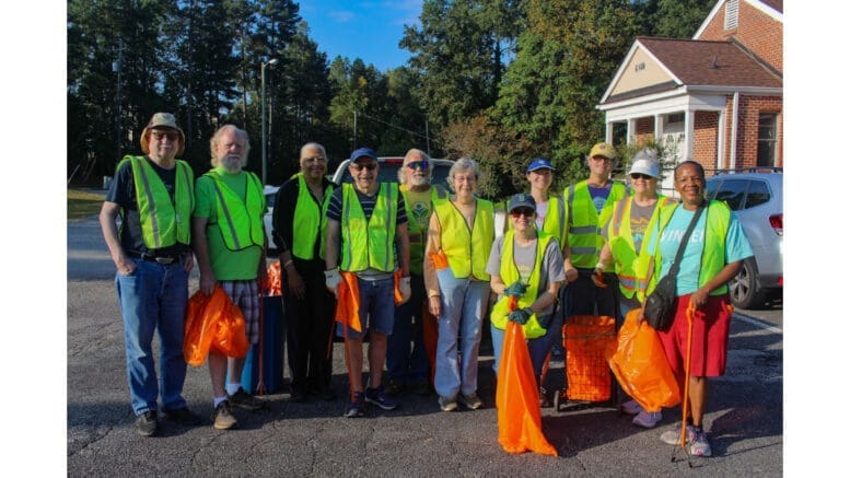 Group photo of volunteers at the Queen Mill Road litter cleanup