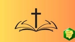 A line drawing of a cross and bible