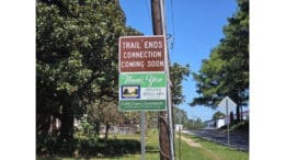 A sign that says "Trail Ends ... Connection Coming Soon"