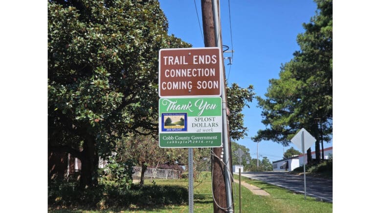 A sign that says "Trail Ends ... Connection Coming Soon"