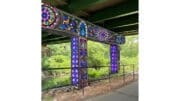 Colorful mural on road supports