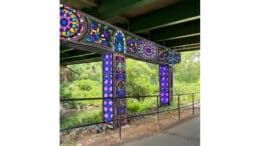 Colorful mural on road supports
