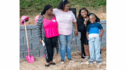 Mikailah Peoples and family at new home site