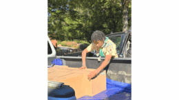 Brandon King loading boxes