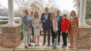 Michael Paris hold award, flanked by Chamber and East Cobb council officials