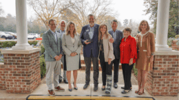 Michael Paris hold award, flanked by Chamber and East Cobb council officials