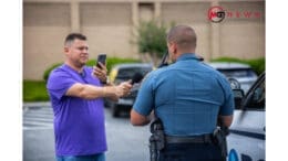 Maria Guevara attempting to interview ICE agent