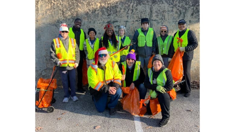 Group photo of volunteers at the latest Queen Mill Road litter cleanup hosted by Friends of Mableton and Keep Cobb Beautiful