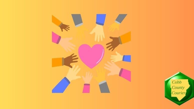 Hands of different colors reaching toward a heart in the center