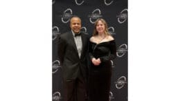 Kennesaw State faculty member Cameron Coates and student Anastasia Morris receiving awards