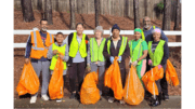 Group photo of volunteers from Vinings Cove Homeowners at Buckner Road