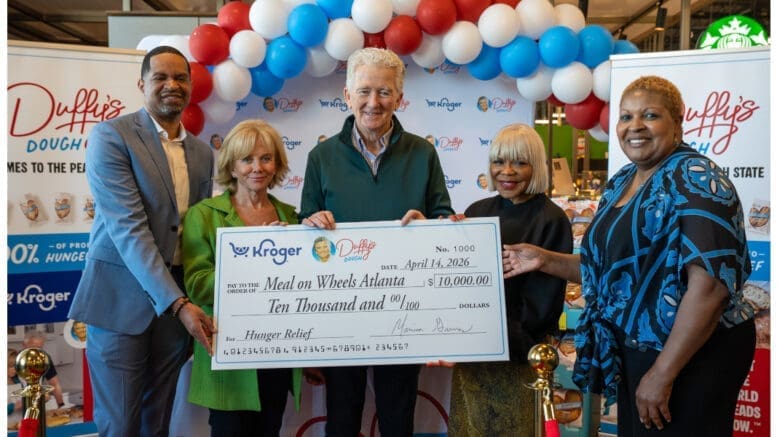 Patrick Duffy and Linda Purl present $10,000 check to Meals on Wheels