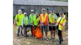 Group photo of volunteers at the Concord Covered Bridge litter cleanup