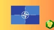 The blue NATO flag with a four-point star in the middle