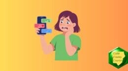 A woman looks on her phone social media with alarm