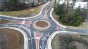 An aerial view of a large roundabout on the South Barrett Reliever