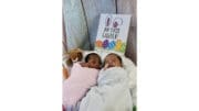 2 babies in Wellstar Cobb Neonatal ICU with a sign "My first Easter"