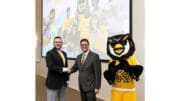 Kennesaw State Vice Provost Sheb True and Oglethorpe Provost and Vice President of Academic Affairs Gabriel Barreneche shake hands