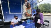 PHOTO: Roy C. Barnes, Project Coordinator, Mobile Prostate Screening Program, Winship Cancer Institute and Jo Lahmon, South Region Manager, Cobb County Public Library