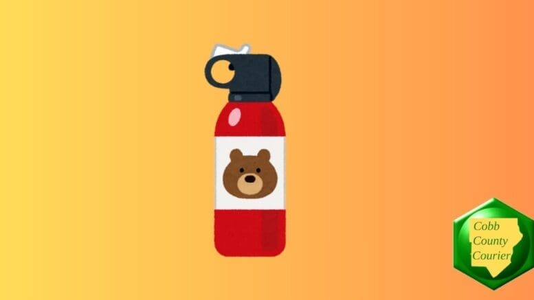 A can of bear spray with a picture of a bear on the cannister