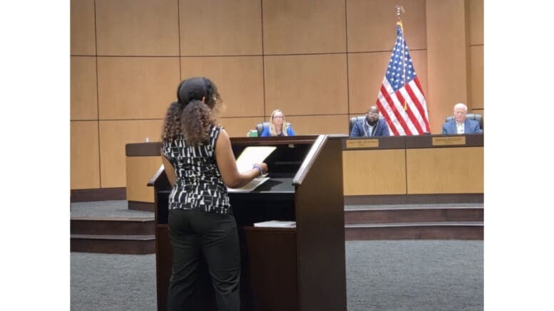 Mira Ugwuadu speaking to the Cobb school board